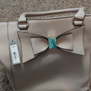New.  Beige purse